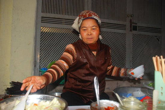 Madame Tuyet holds court. Madame Tuyet holds court.