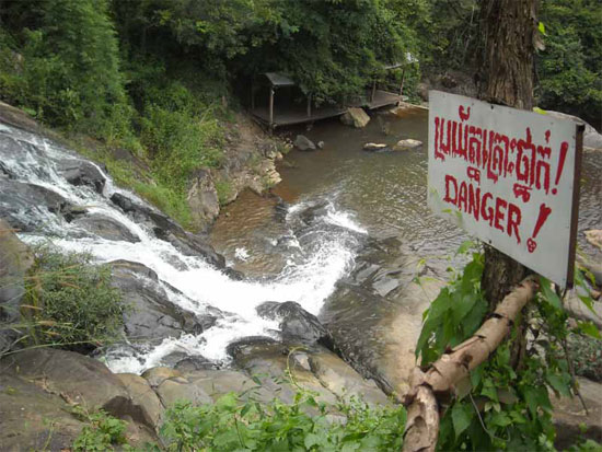 Read the sign! Waterfall outside Pailin. Read the sign! Waterfall outside Pailin.