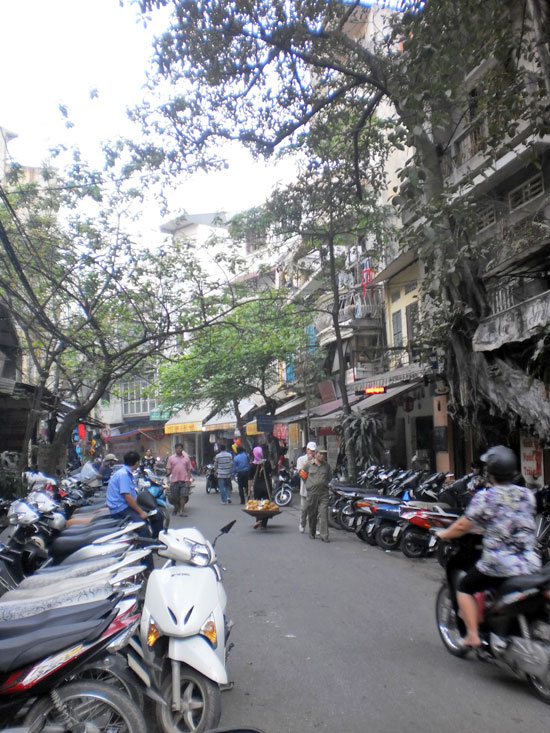 Motorbikes and narrow streets - Hanoi in a nutshell. Motorbikes and narrow streets - Hanoi in a nutshell.