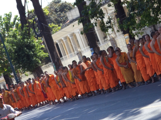 Monks queueing for a viewing