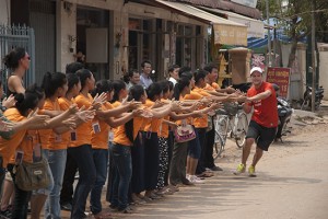 The kids from Sala Bai, with Sam McGoun who ran 625km across Cambodia to raise funds for the school. Makes buying a book look easy!