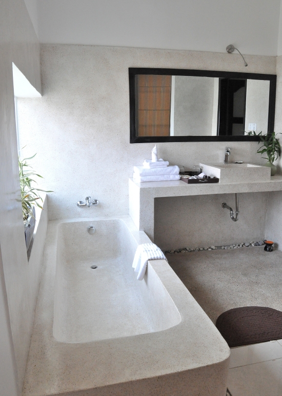 Plenty of room for a post-temple soak in your industrial chic tub.