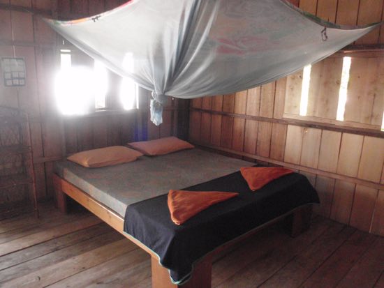 The bedroom is a room with a bed.