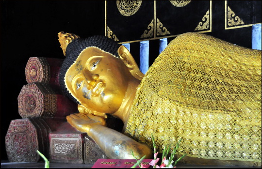 This reclining Buddha is sporting the winter collection This reclining Buddha is sporting the winter collection