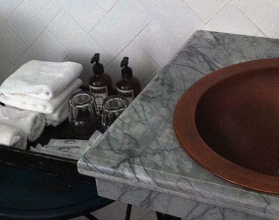 Cararra marble (or near enough), copper and tasteful toiletries. Cararra marble (or near enough), copper and tasteful toiletries.