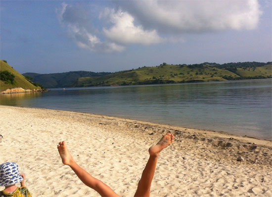 Seraya's main beach. Not my legs.