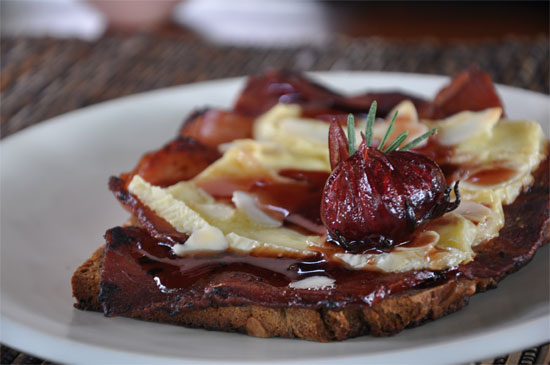 Warm Brie on crispy bacon with toasted almonds and Rosella pepper sauce. 44,000 rupiah.