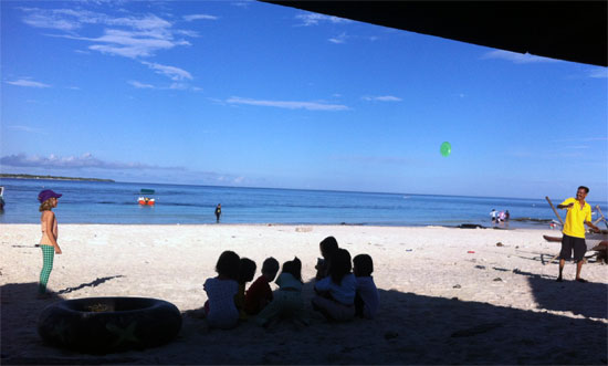 Frisbee with the locals and a three-in-one at a beachside warung. Frisbee with the locals and a three-in-one at a beachside warung.