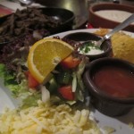 Order a mixed plate of beef and chicken fajitas, portions are generous and servings are tasty.