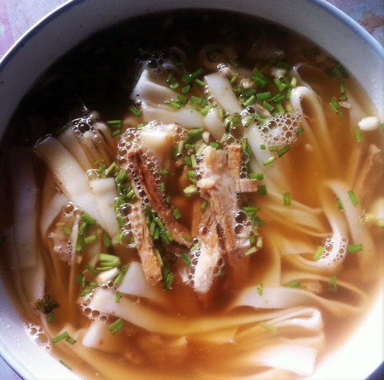 Sit back, order a noodle soup and watch the world go by Sit back, order a noodle soup and watch the world go by