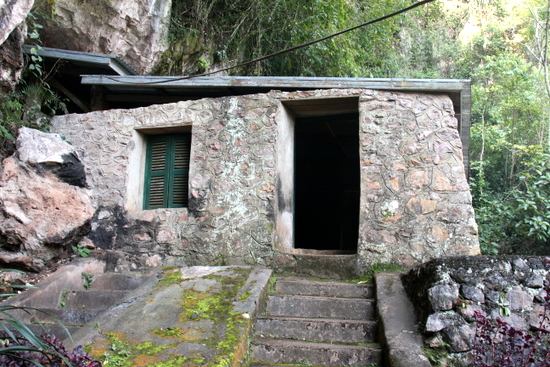 The entrance to someone's home in a cave