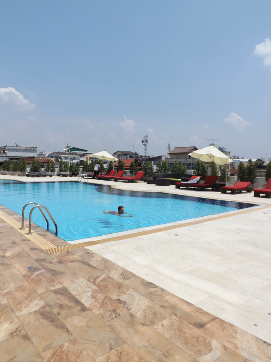 The poolside at Lao Plaza Hotel