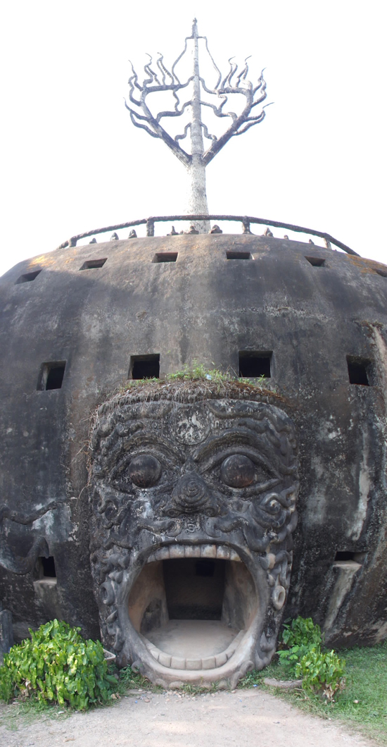 Come to Buddha Park and climb inside a giant head filled with several layers of hell.