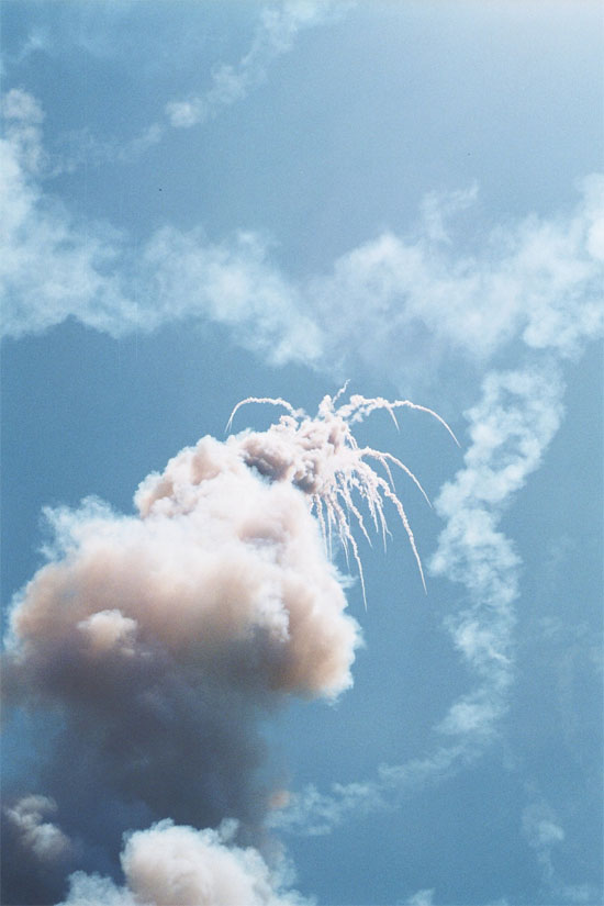 A rocket in Thailand's version of the festival explodes over Yasothon. Obviously the Lao make them better.