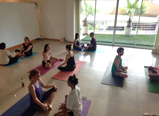 Affordable, donation based yoga at K-Village Mall with Bangkok Farmers Market Community Yoga