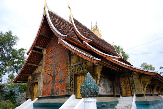 Wat Xieng Thong, located at the end of the peninsula, is not to be missed.