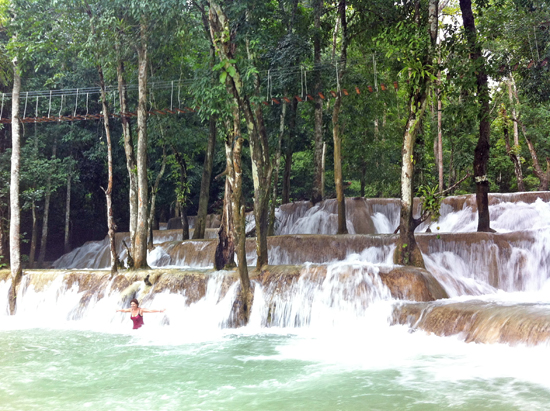 Cooling off in Tad Se Waterfall.