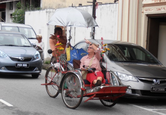 Travel at a more relaxed pace on one of Penang's cycle trishaws.