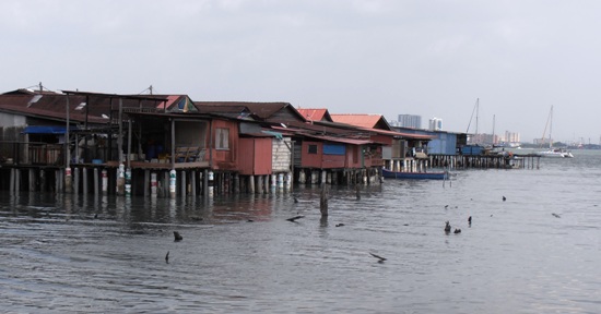 The clan jetties of Penang are whole communities built on stilts over the tidal mud flats.