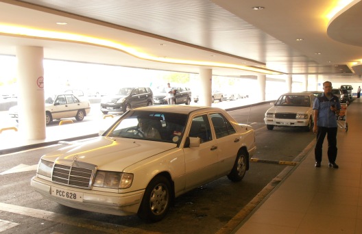 Pick up a white cab from the airport into Georgetown and travel in style!