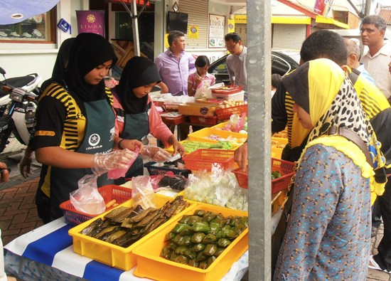 Sweet 'kuih bugis', wrapped in banana leaves and grilled, is a Ramadan treat.