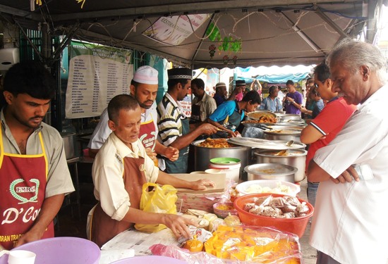 Stallholders do a roaring business at the nightly bazaar.