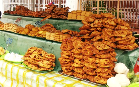 Stalls piled high with deep fried Indian snacks are quickly depleted when the day's fast ends.