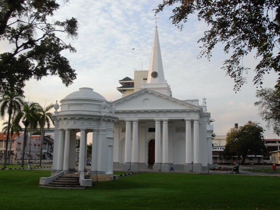 The white edifice of St. George's Church, in the old British quarter, stands at one end of the Street of Harmony.