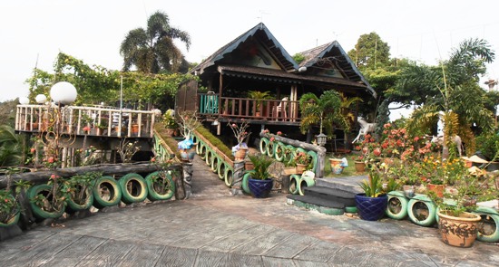 The well maintained garden is full of curiosities.