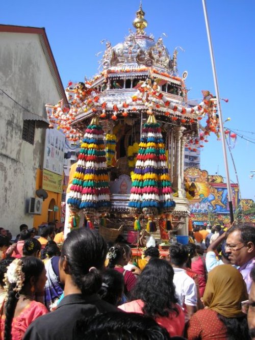 The statue of Subramaniam travels in style through the streets of Georgetown.