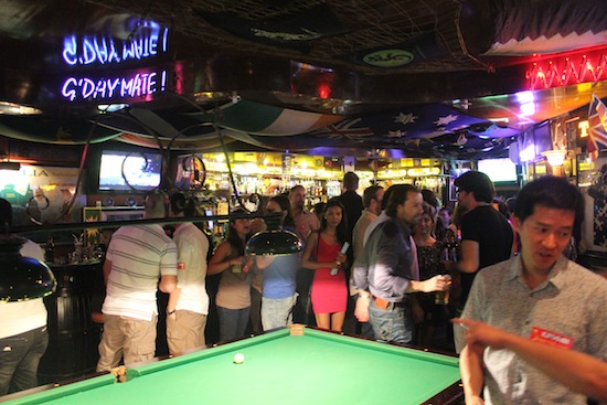 People would have more room if there wasn't a pool table. People would have more room if there wasn't a pool table.