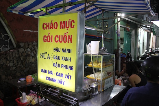 That's a fancy sign for a street cart! That's a fancy sign for a street cart!