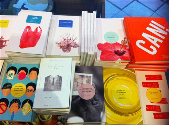 Pick up a book by a Singaporean author.