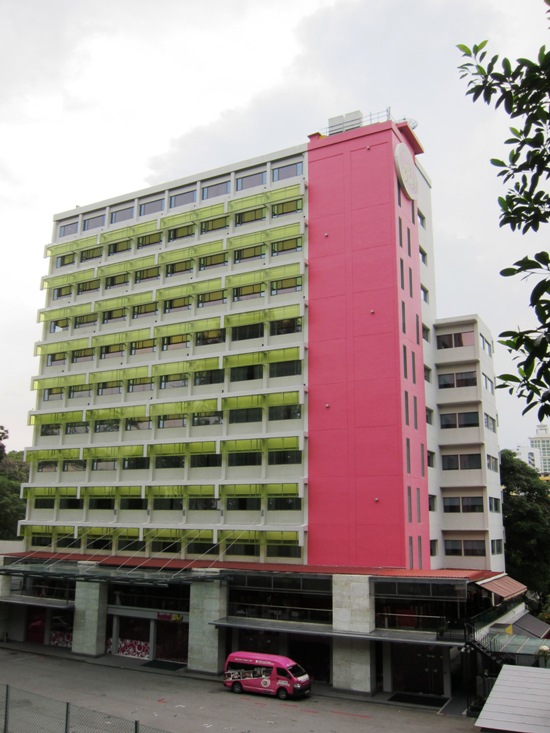 The Hotel Re! looks like a block of Singapore public housing flats - save for the colour scheme.