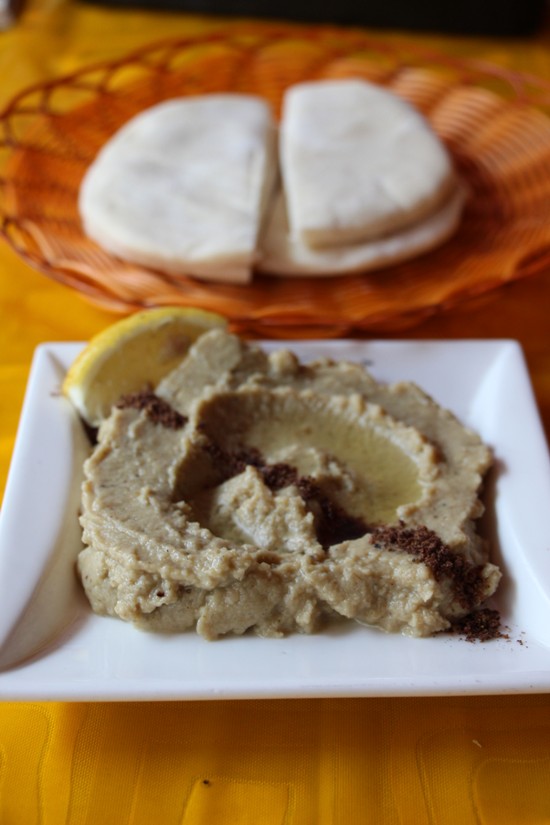 The Café le Caire's dips and breads are particularly good. Shown here are babaganush, an eggplant dip pureed with tahini, and pita bread.