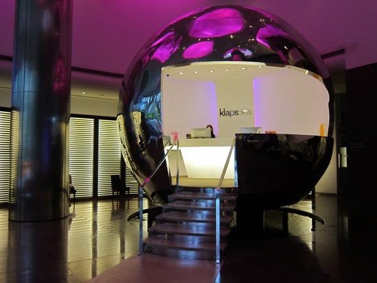 The reception at klapsons reflects the freeform lights that make up the ceiling.