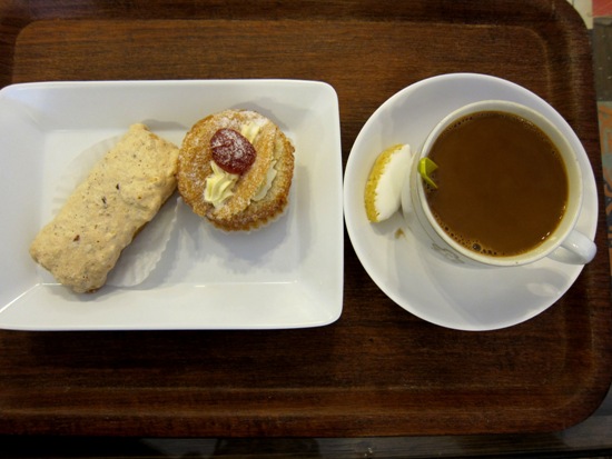 Almond fingers and butterfly cupcake - washed down with a cup of kopi.