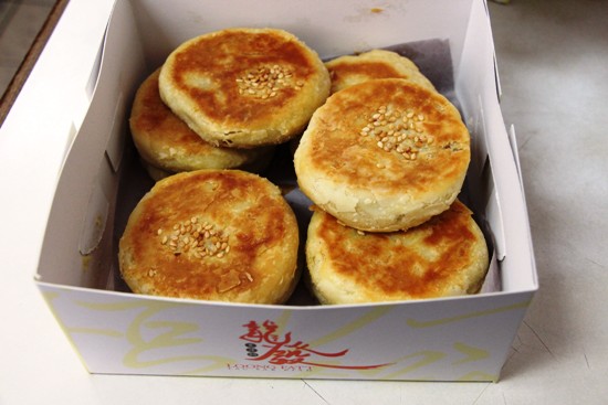 Loong Fatt Tau Sar Piah, a deliciously flaky biscuit stuffed with bean paste filling.
