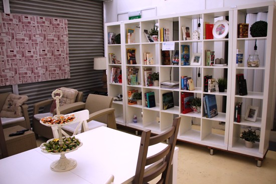 The chill-out area at Blanc Inn - a large bookshelf like this one always feels like home.