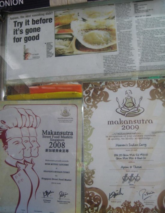 Hawkers proudly display their Makansutra reviews