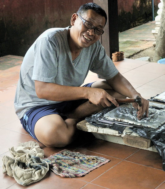 Silver craftsman at work on a new tableau Silver craftsman at work on a new tableau