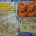 Royal India's specialty sweets on display outside.