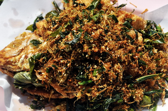 Deep fried fish with garlic flakes Deep fried fish with garlic flakes