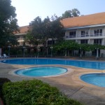 No, it's not a resort. Those are hospital rooms overlooking the pool.