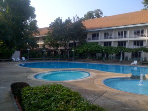 No, it's not a resort. Those are hospital rooms overlooking the pool.