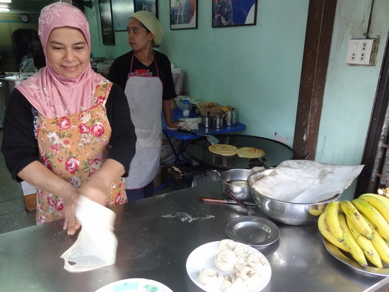 The art of roti-making on display at Aroon's.