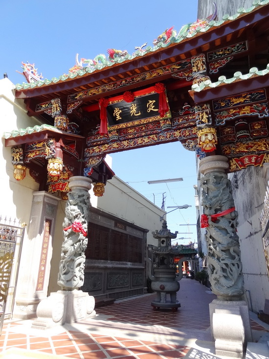 Enter the dragon. The shrine's new intricate archway.