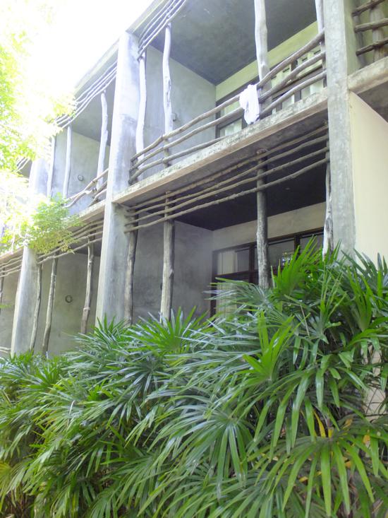 Grey concrete contrasting with the lush green. Hardly your average backpacker pad.