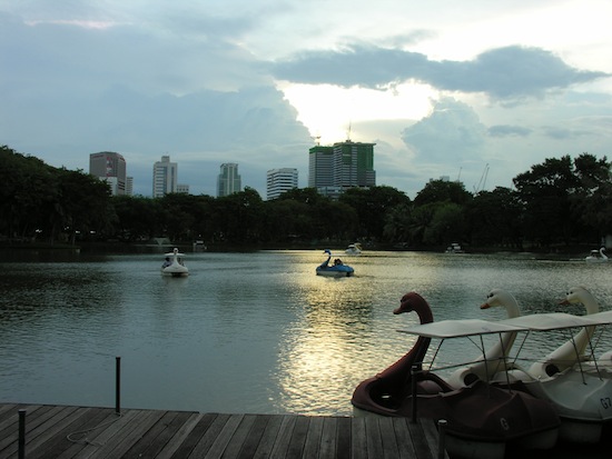 A few clouds don't scare off the swan-boaters.