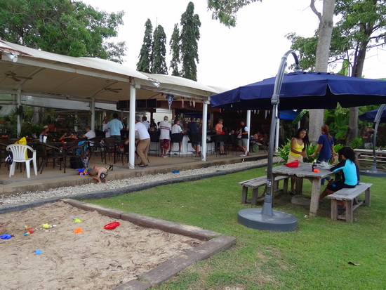 Something for everyone: a sandbox for the kids and a bar for the bigs.